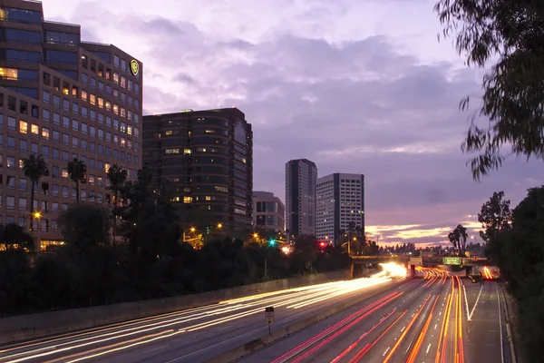 The Ventura Freeway through Burbank's Media District at sunset
